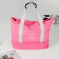 Grote roze canvas reistas sporttas, fitness schoudertas met apart schoenenvak aan de onderkant. - Roze