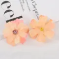 Detail shot of artificial silk flower heads, multi-layer six-petal DIY wedding decor props. - Style 5