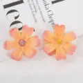 Künstliche Seidenblumenköpfe im Detail, DIY Bastelmaterial, orangefarbener Farbverlauf. - Stil 4