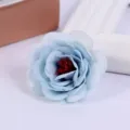 Close up view of light blue artificial rose flower head showing detailed silk petals and stamen. - Style 3