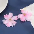 Close-up detail of DIY multi-layer pink silk artificial flower heads for craft decor. - Style 12