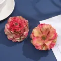 Close-up detail of artificial fabric peony flowers with burnt edge satin chiffon. Perfect for decor. - 16#
