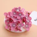 Pink artificial hydrangea flower heads close up, perfect for wedding and DIY craft projects. - Style 12