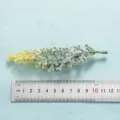 Artificial plant leaf foliage decoration close up view with measuring ruler detail - Style 10