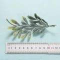 Artificial green leaf plant branch for home living room decor and floral arrangement detail view - Style 11