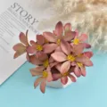 Artificial silk flowers pot, mauve flower heads with yellow centers in white pot. - Style 6