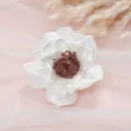 Close up of white artificial peony flower head with detailed dark center and mesh background - Style 7