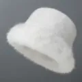 Close-up detail of the soft white plush faux fur texture on a cozy winter bucket hat. - Adjustable / White