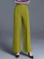 Detail view of women's high-waisted wide-leg casual pants, featuring a relaxed fit for spring. - Olive