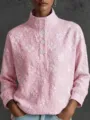Close-up detail of a pink long-sleeve top featuring intricate white floral embroidery and buttons. - S / Pink