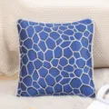 Cuscino quadrato jacquard geometrico blu con piping intrecciato argentato per divano. - Blu