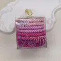 Set elastici capelli rosa sfumato in scatola trasparente, ideale per styling quotidiano. - Rosso rosa