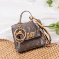 Mini bolso gris textura mármol llavero colgante con herrajes dorados y pañuelo seda. - Gris