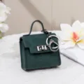 Dunkelgrüne Mini-Taschen-Schlüsselanhänger, schicke Handtaschen-Anhänger mit Metallschloss. - Grün