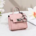 Rosa Mini Handtasche Anhänger Schlüsselanhänger, süße Münztasche und Kopfhörertasche chic. - Rosa