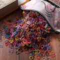 Colorful disposable rubber hair ties detail shot, high elastic small hair bands for girls styling. - 1000 Pieces/Pack / Rainbow Black