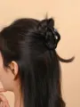 Black hair claw clip detail shot, simple minimalist design for daily elegant hair styling. - Small Cloud Claw / 7cm / Black