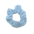 Closeup detail of light blue fabric hair scrunchie, soft jersey material, minimalist style. - Light Blue