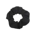 Close up detail of a minimalist black fabric hair scrunchie, classic daily hair accessory. - Black