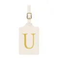 Vue detaillee de l'etiquette de bagage en cuir PU beige avec elegante lettre U brodee d'or. - Lettre U / Blanc Cassé