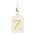 Gros plan d'une étiquette de bagage beige avec un élégant détail de lettre Z brodée. - Lettre Z / Blanc Cassé