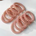 Matte pink telephone cord hair ties, flexible plastic hair coils for daily styling. - 1 Piece Pack / Pink