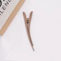 Large matte duckbill hair clip detail view, stylish solid color hair accessory for women daily updo. - Camel