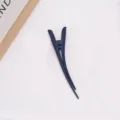 Large matte blue duckbill hair clip detail showing the fine texture and secure grip. - Dark Blue