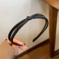 Black PU leather knotted headband for women, stylish minimalist hair hoop, French chic accessory. - Black