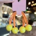 Children candy colored ball hair ties with cute glossy beads and pink display card for kids. - Yellow