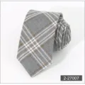 Grey plaid tie close-up detail, featuring clear fabric texture and neat woven pattern. - Color 007