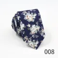 Detailed close-up of the stylish narrow floral cotton tie showing the intricate pattern texture. - Color 008
