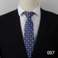 Close-up view of a blue geometric patterned business necktie showcasing detailed fabric texture. - Style 007
