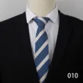 Close-up detail of the classic blue and beige diagonal striped business necktie fabric. - Style 010