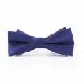 Close up detail of a classic dark blue textured bow tie for men, perfect for formal suits. - Dark Blue