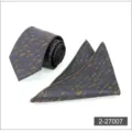 Close-up detail of mens business tie and pocket square set featuring abstract dash pattern. - Color 007