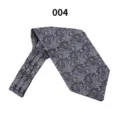 Detailed view of the gray paisley jacquard men's cravat, showing the intricate fabric texture. - 004 (Dark Grey Paisley)
