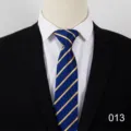 Detailed view of the blue and gold striped business tie, showcasing fine fabric texture and detail. - Color 013