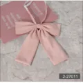 Pink JK bow tie with adjustable strap, sweet Japanese style school uniform accessory detail. - Pink