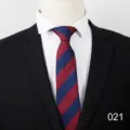 Men's business formal striped tie detail shot, classic red and blue diagonal stripes design. - Color 021