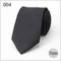 Cravatta nera da uomo vista dettaglio, elegante trama per abbigliamento formale, larghezza 7cm. - Nero Tessuto