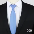 Detail view of blue floral jacquard necktie for men business suit narrow width silk tie - Blue Small Flower