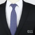 Close-up detail of the men's business jacquard tie featuring a classic patterned design. - Geometric Jacquard