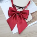 Red JK uniform bow tie for women, classic pleated satin sailor suit neckwear accessory. - Red