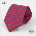Blue and red geometric patterned mens business suit necktie, detailed view of rolled tie. - No. 027