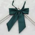 Dark green fine-ribbed JK uniform bowtie close-up detail shot, showing exquisite pointed design. - 012-Dark Green