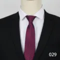 Close-up detail of a classic burgundy business tie featuring elegant diagonal striped patterns. - Style 029