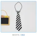 Detail view of the black and white striped kids necktie, showing the classic diagonal pattern. - No. 002