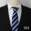 Classic men's blue striped tie with white shirt and black suit jacket detail display view. - Blue A003