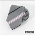 Detailed shot of a stylish men's gray necktie featuring classic black and pink diagonal stripes. - 7
